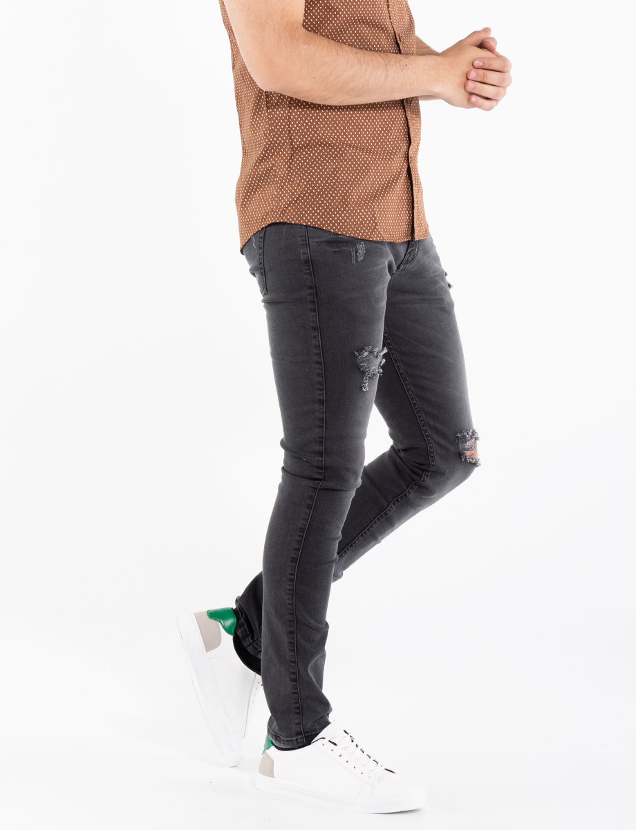 Jean skinny roto gris oscuro