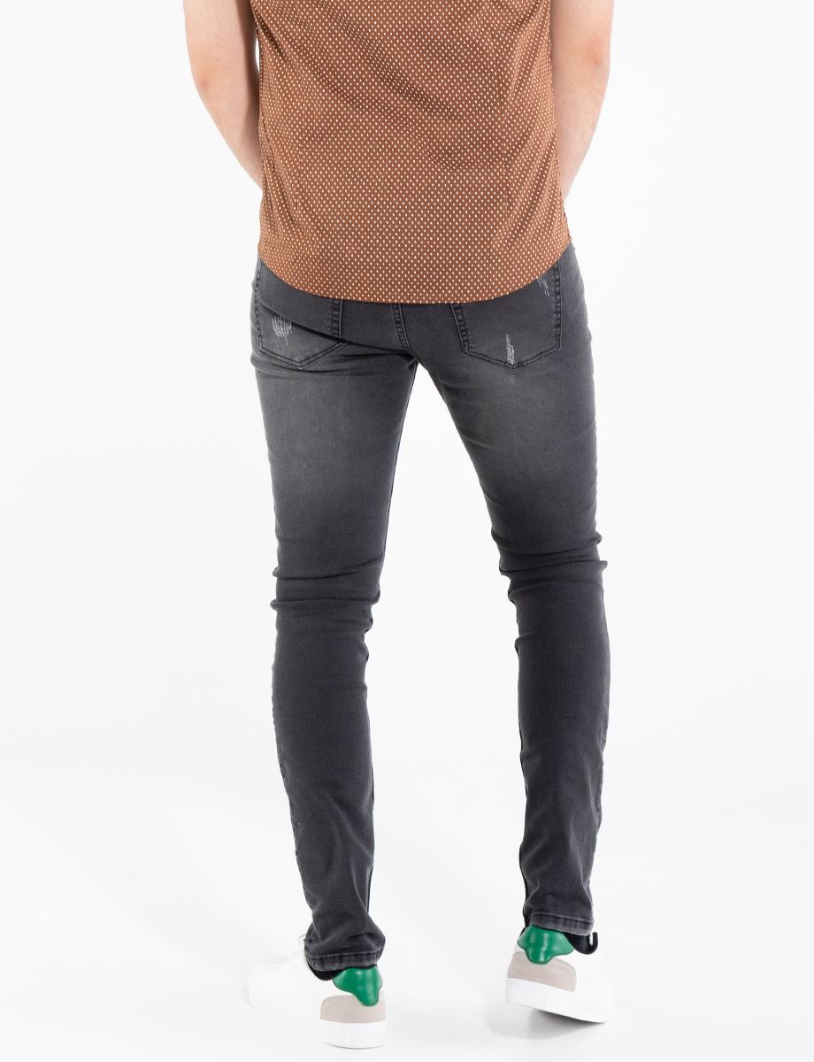 Jean skinny roto gris oscuro