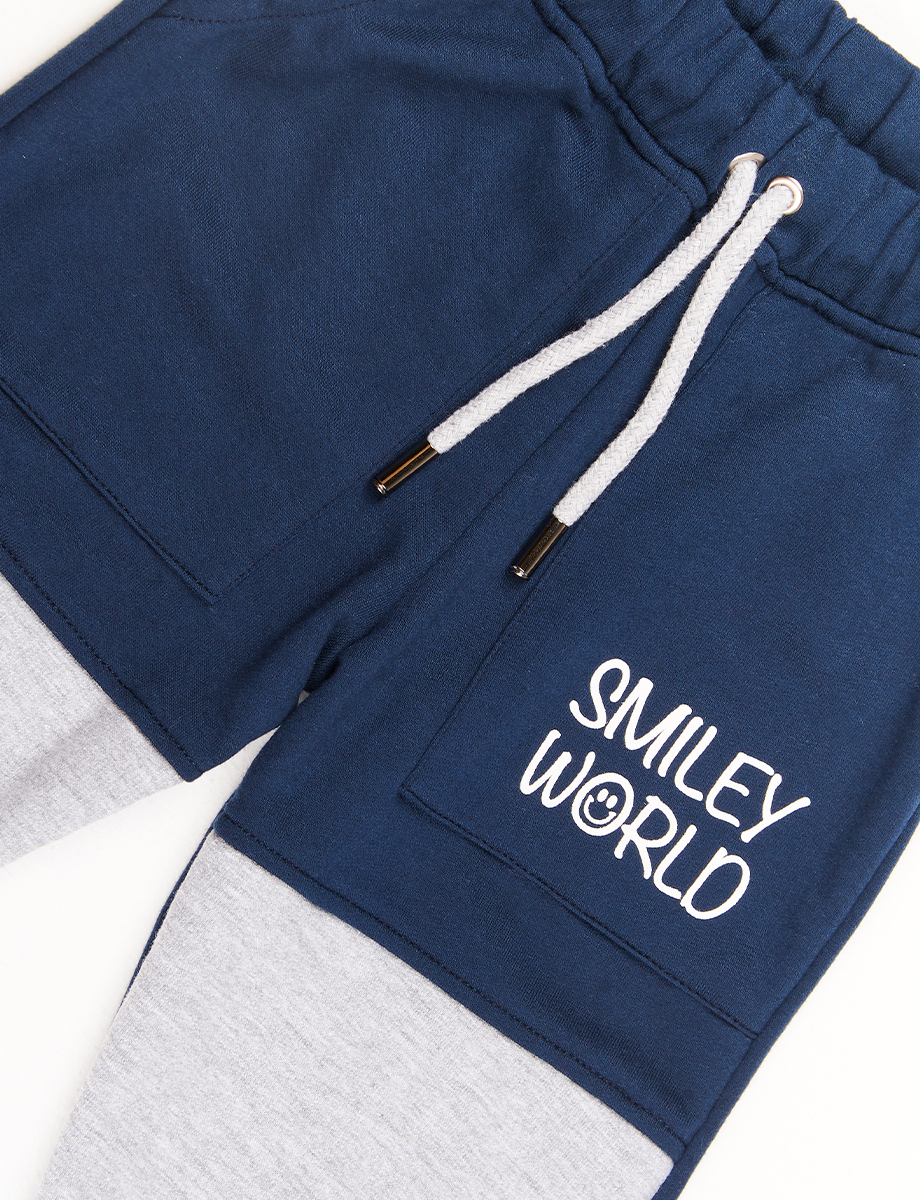 Jogger Bloque de Color Smiley Word