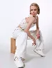 Pantalón Ojalillo Blanco Chicas Val – Prenda elegante para días cálidos