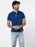 Camiseta Polo Azul Medio Llana Hombre – Básico con aire deportivo