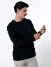 Buzo Llano Negro Hombre – Comodidad urbana con estilo atemporal