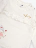 Buzo con Vuelos Crudo Niña – Detalle delicado con estilo tierno