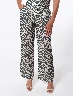 Pantalón Animal Print Crudo Mujer – Tendencia audaz y moderna