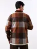 Chaqueta a Cuadros Café Hombre Un clásico moderno para destacar